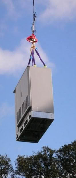 Industrial cabinet lifted by crane