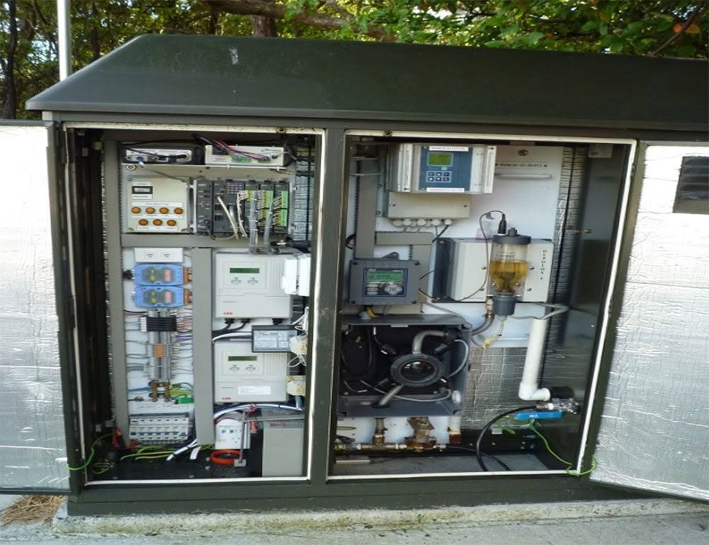 Open control cabinet with wiring